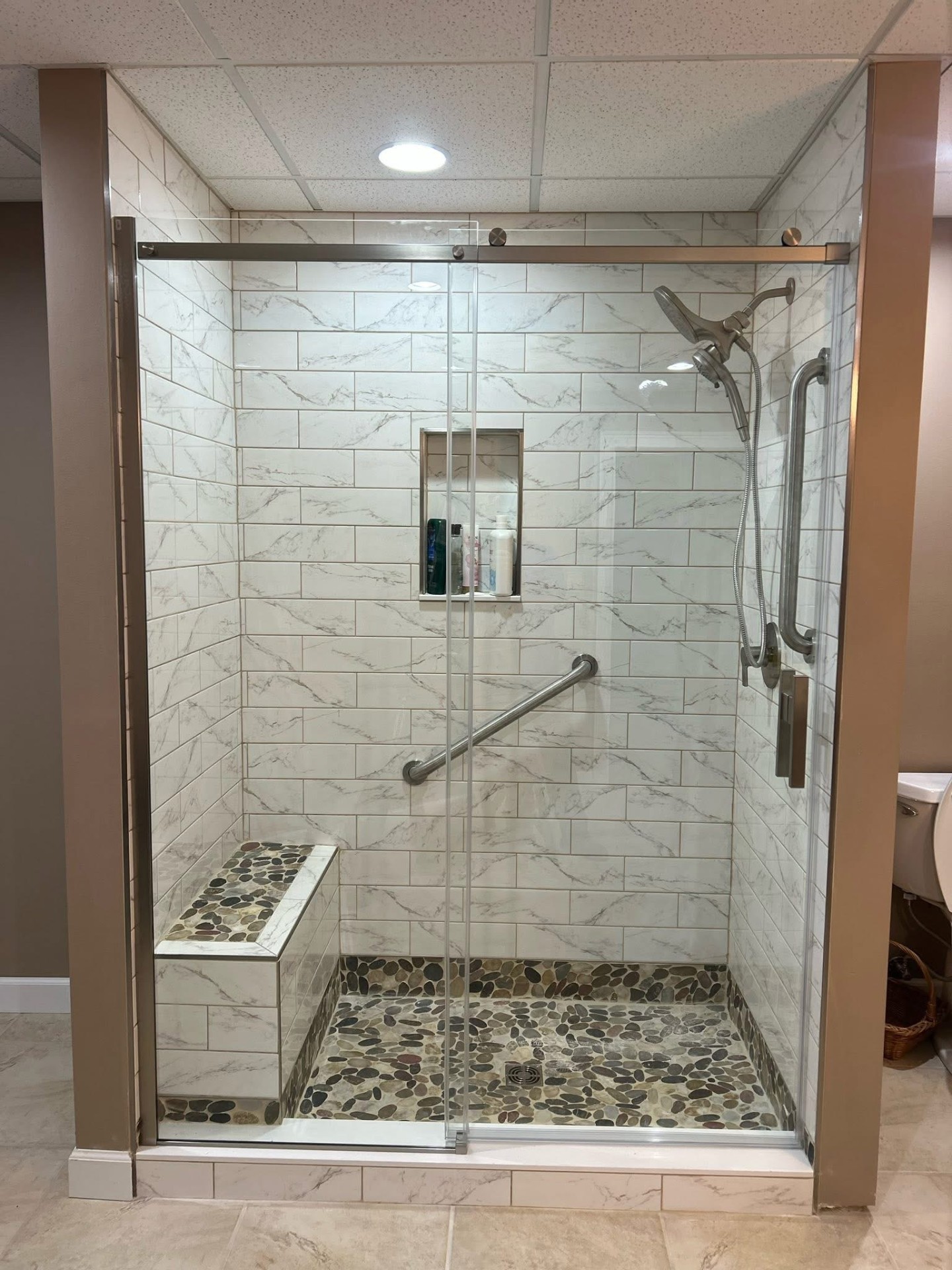 Basement Suite: Marble Subway Shower after